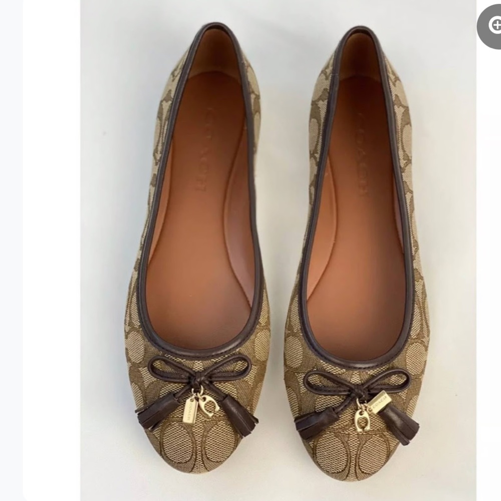 Classic COACH signature ballet flats featuring the iconic “C”